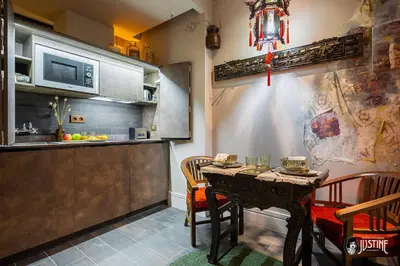 Una cocina o zona de cocina en Apartamento Opium Den by Justine Apartments Apartamento turístico en Madrid Río