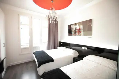 Cama o camas de una habitación en Vitium Urban Suites