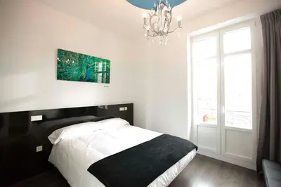 Cama o camas de una habitación en Vitium Urban Suites