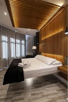 Cama o camas de una habitación en Vitium Urban Suites