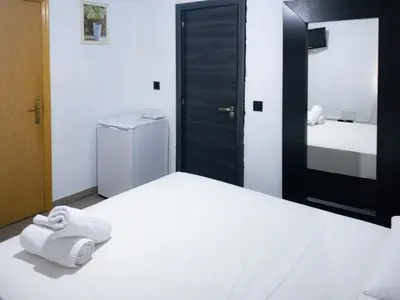 Cama o camas de una habitación en Hostal Andrea