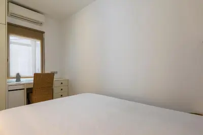 Cama o camas de una habitación en HOMEABOUT DIEGO DE LEÓN Apartment I