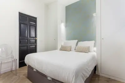 Cama o camas de una habitación en Zoko Suites en Madrid
