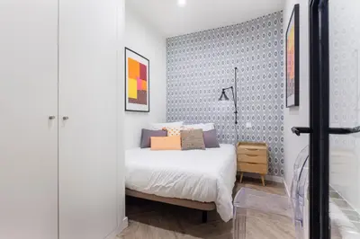 Cama o camas de una habitación en Zoko Suites en Madrid