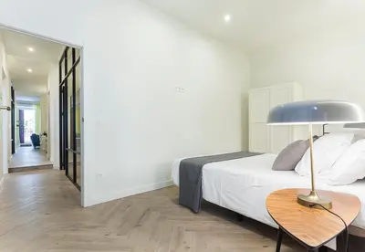 Cama o camas de una habitación en Zoko Suites en Madrid
