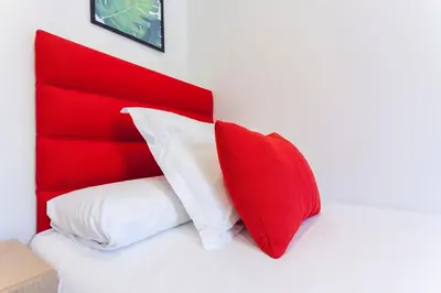 Cama o camas de una habitación en Rio Plaza en Madrid