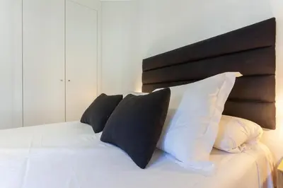 Cama o camas de una habitación en Rio Plaza en Madrid