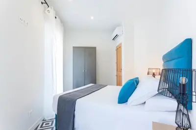 Cama o camas de una habitación en Rio Plaza en Madrid