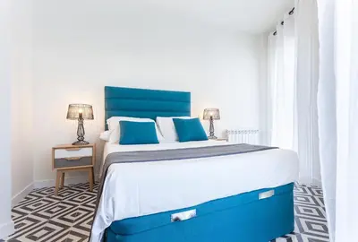 Cama o camas de una habitación en Rio Plaza en Madrid