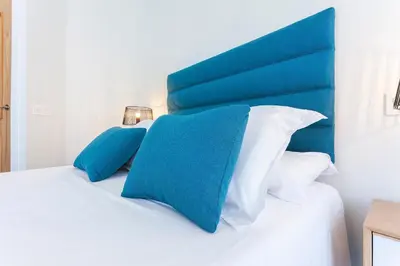 Cama o camas de una habitación en Rio Plaza en Madrid