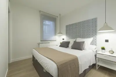 Cama o camas de una habitación en Bravo en Madrid