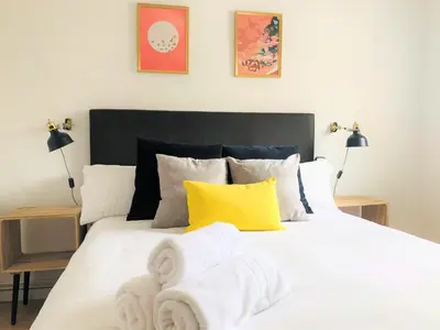 Cama o camas de una habitación en GRAN VÍA CHUECA Apartamentos Noxi 6 personas