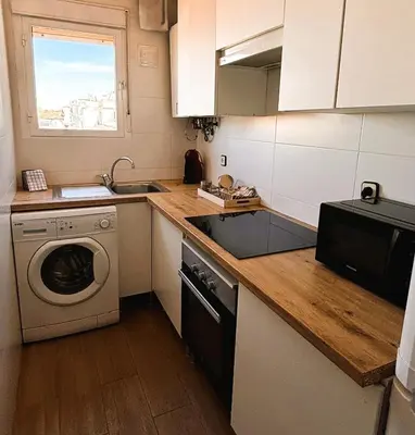 Una cocina o zona de cocina en GRAN VÍA CHUECA Apartamentos Noxi 6 personas