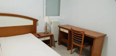 Cama o camas de una habitación en Aloja Madrid
