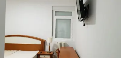 Una televisión o centro de entretenimiento en Aloja Madrid