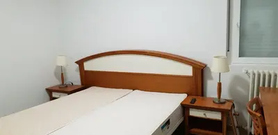 Cama o camas de una habitación en Aloja Madrid