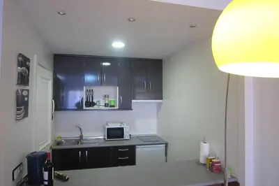 Una cocina o zona de cocina en Apartamento GP JUNTO AL PARQUE DEL RETIRO