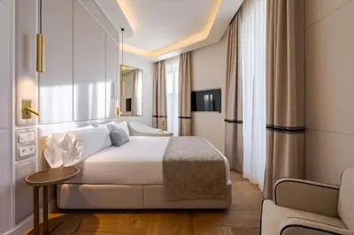 Cama o camas de una habitación en La Fonda de los Príncipes