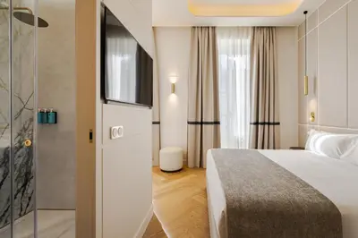 Cama o camas de una habitación en La Fonda de los Príncipes