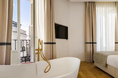 Cama o camas de una habitación en La Fonda de los Príncipes