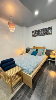 Cama o camas de una habitación en Palacio Real Citymad