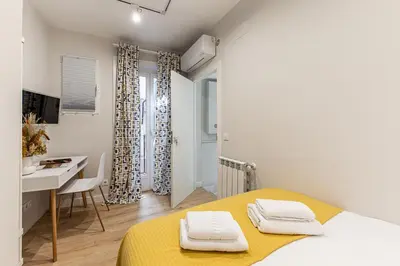 Cama o camas de una habitación en Waou Don Quixote Las Letras