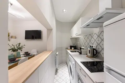 Una cocina o zona de cocina en Waou Don Quixote Las Letras