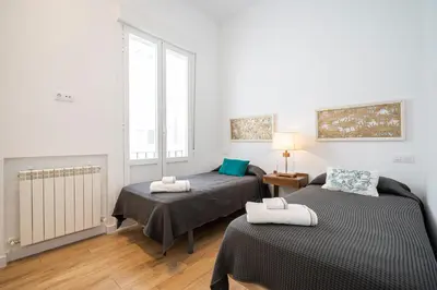 Cama o camas de una habitación en Ever House - El CORAZON de CHUECA