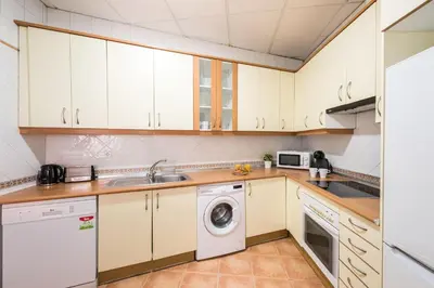 Una cocina o zona de cocina en Luminosos apartamentos con ascensor en el Centro, SOL