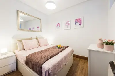 Cama o camas de una habitación en Luminosos apartamentos con ascensor en el Centro, SOL