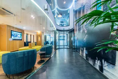 Una televisión o centro de entretenimiento en Hotel Indigo Madrid - Gran Vía by IHG
