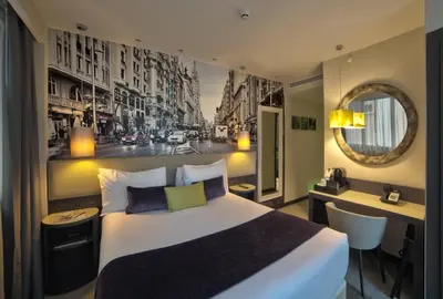 Cama o camas de una habitación en Hotel Indigo Madrid - Gran Vía by IHG