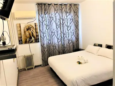 Cama o camas de una habitación en Deluxe room center