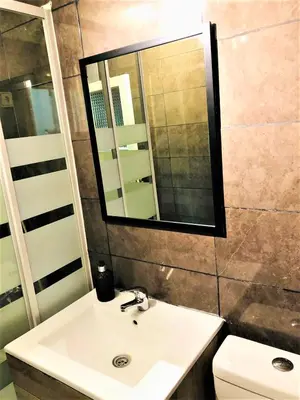 Un baño de Deluxe room center