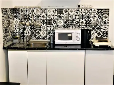 Una cocina o zona de cocina en Deluxe room center