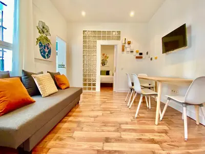 Una televisión o centro de entretenimiento en Malasaña Madrid - Apartamento de 1 dormitorio