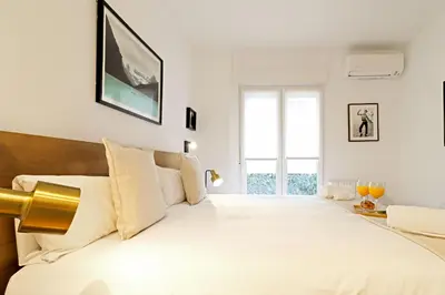 Cama o camas de una habitación en Royal Madrid