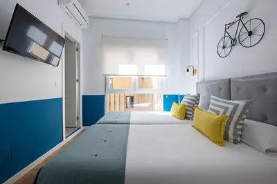 Cama o camas de una habitación en Acogedor y Céntrico Apartamento en GRAN VÍA