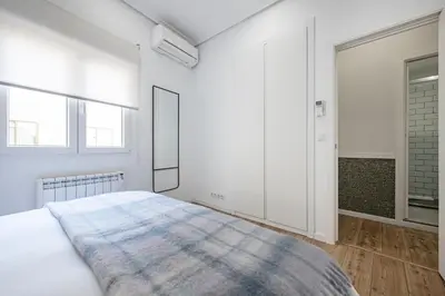 Cama o camas de una habitación en Acogedor y Céntrico Apartamento en GRAN VÍA