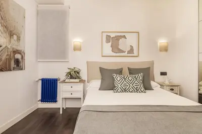 Cama o camas de una habitación en ACOGEDOR (2h+2B) En Malasaña