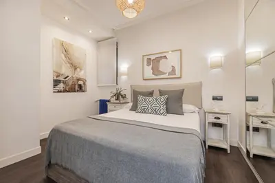 Cama o camas de una habitación en ACOGEDOR (2h+2B) En Malasaña