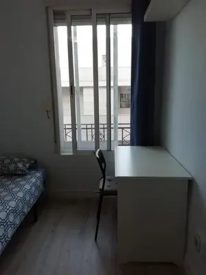 Cama o camas de una habitación en Habitaciónes Luminosas y acogedoras