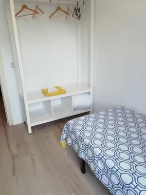 Cama o camas de una habitación en Habitaciónes Luminosas y acogedoras