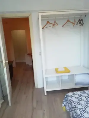 Cama o camas de una habitación en Habitaciónes Luminosas y acogedoras
