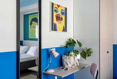 Cama o camas de una habitación en Bob W Madrid Chueca