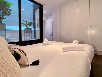 Cama o camas de una habitación en Malasaña Center - Apartamento para 4 en el centro, AC
