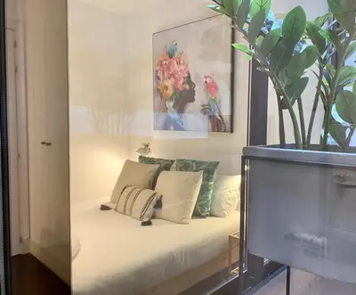 Cama o camas de una habitación en Malasaña Center - Apartamento para 4 en el centro, AC