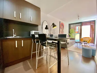 Una cocina o zona de cocina en Malasaña Center - Apartamento para 4 en el centro, AC