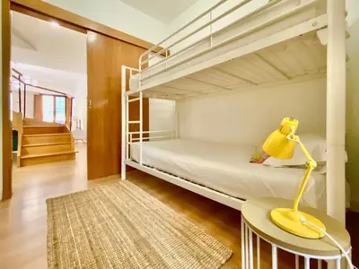 Cama o camas de una habitación en Ópera - Dúplex de 3 dormitorios con piscina