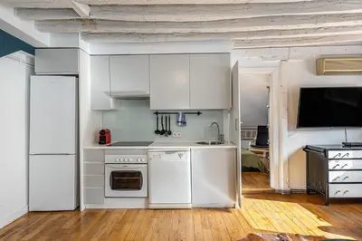 Una cocina o zona de cocina en Waou Puerta del Sol II - Alquiler Corta Duración